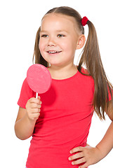 Image showing Little girl with lollipop