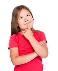 Image showing Little girl is thinking about something