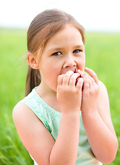 Image showing Portrait of a little girl with apple