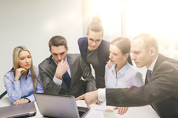 Image showing business team with laptop having discussion