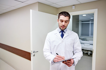 Image showing doctor with clipboard at hospital