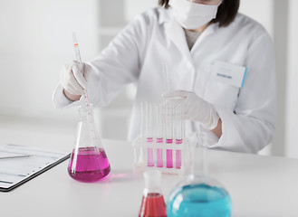 Image showing close up of scientist making test in lab