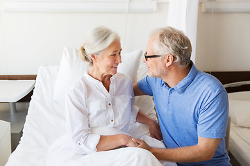 Image showing senior couple meeting at hospital ward