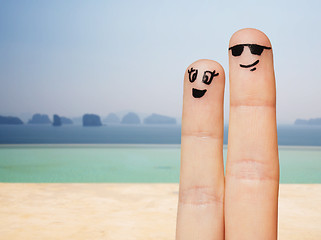 Image showing close up of two fingers with smiley faces
