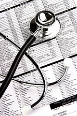 Image showing Stethoscope Over A Report