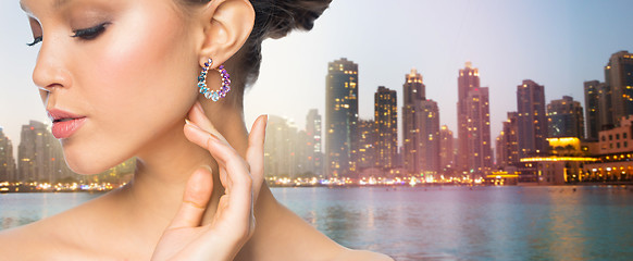 Image showing close up of beautiful woman face with earring