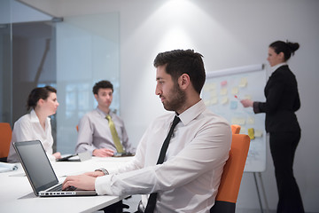 Image showing young business man at meeting