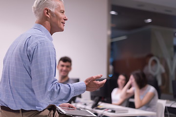 Image showing teacher and students in computer lab classroom