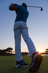 Image showing golfer hitting long shot