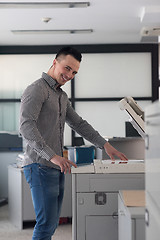 Image showing young  business man copy documents