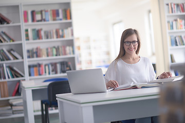 Image showing female student study in school library