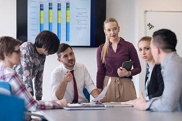 Image showing young business people group on meeting at modern office