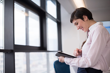 Image showing business woman on meeting  using tablet