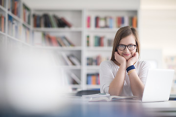 Image showing female student study in school library