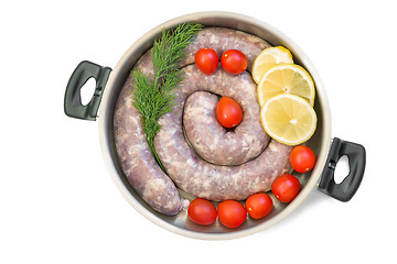 Image showing Homemade pork sausage in a frying pan for a roast.