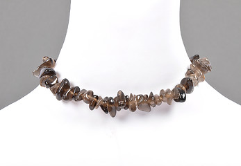 Image showing Splintered smoky quartz chain on bust