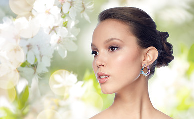 Image showing close up of beautiful woman face with earring