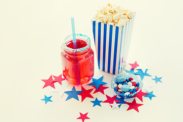 Image showing drink and popcorn with candies on independence day