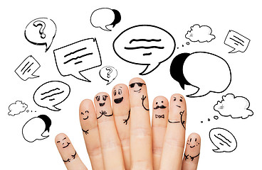 Image showing close up of hands and fingers with smiley faces