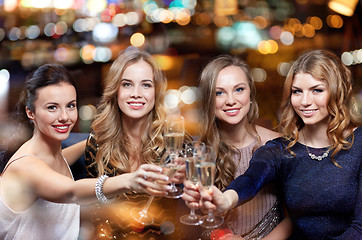 Image showing happy women with champagne glasses at night club