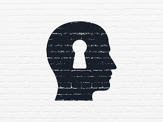 Image showing Education concept: Head With Keyhole on wall background