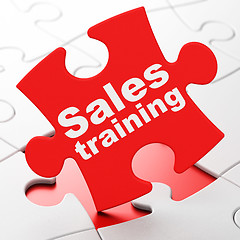 Image showing Advertising concept: Sales Training on puzzle background