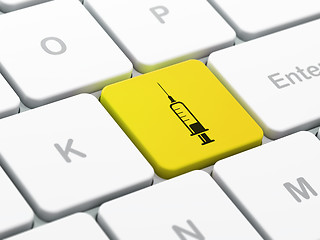 Image showing Healthcare concept: Syringe on computer keyboard background