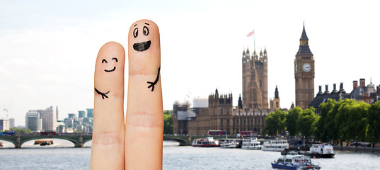 Image showing close up of two fingers with smiley faces