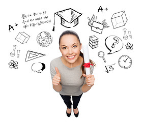 Image showing woman with diploma showing thumbs up over doodles