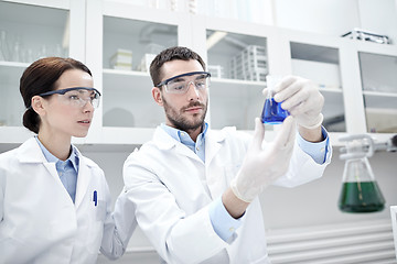 Image showing young scientists making test or research in lab