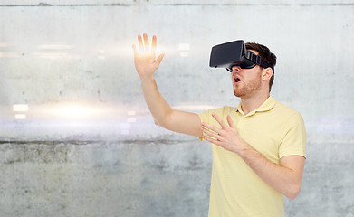 Image showing happy man in virtual reality headset or 3d glasses