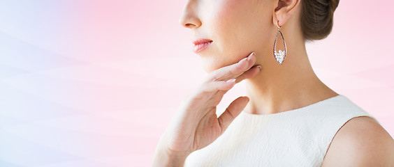 Image showing close up of beautiful woman face with earring