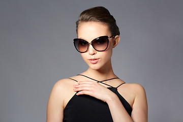 Image showing beautiful young woman in elegant black sunglasses