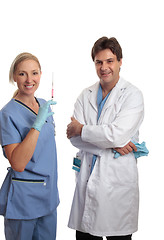 Image showing Surgeon and scrub nurse