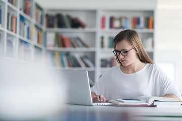 Image showing female student study in school library