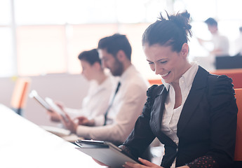 Image showing business woman on meeting  using tablet