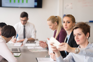 Image showing young business people group on team meeting at modern office