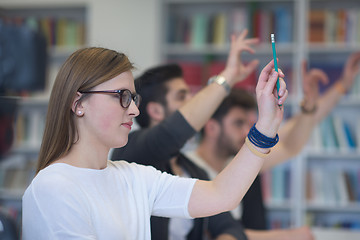 Image showing group of students  raise hands up