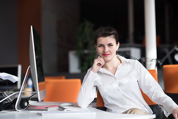 Image showing happy young business woman relaxing and geting insiration