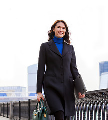 Image showing Smiling businesswoman outdoors