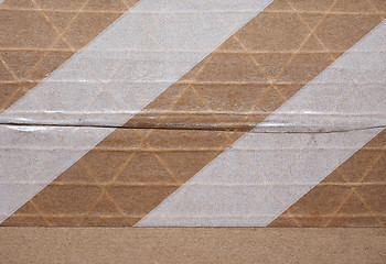 Image showing Packet parcel with striped tape