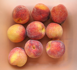 Image showing Many peach fruits