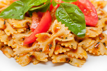 Image showing Italian pasta farfalle butterfly bow-tie and tomato sauce