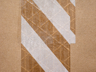 Image showing Packet parcel with striped tape