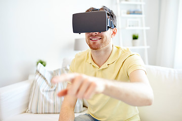 Image showing young man in virtual reality headset or 3d glasses