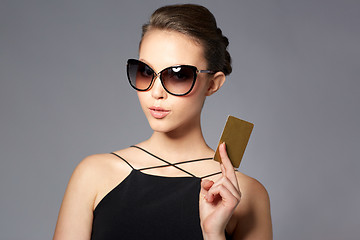 Image showing beautiful young woman in elegant black sunglasses