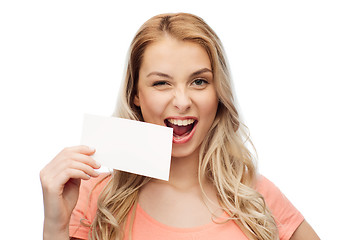 Image showing happy woman or teen girl with blank white paper