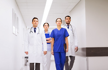 Image showing group of medics or doctors at hospital corridor