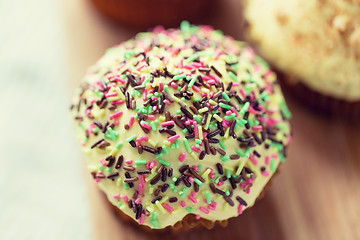 Image showing close up of glazed cupcake or muffin on table