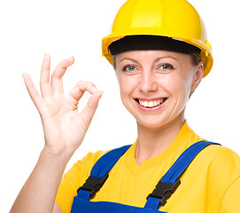 Image showing Young construction worker is showing OK sign